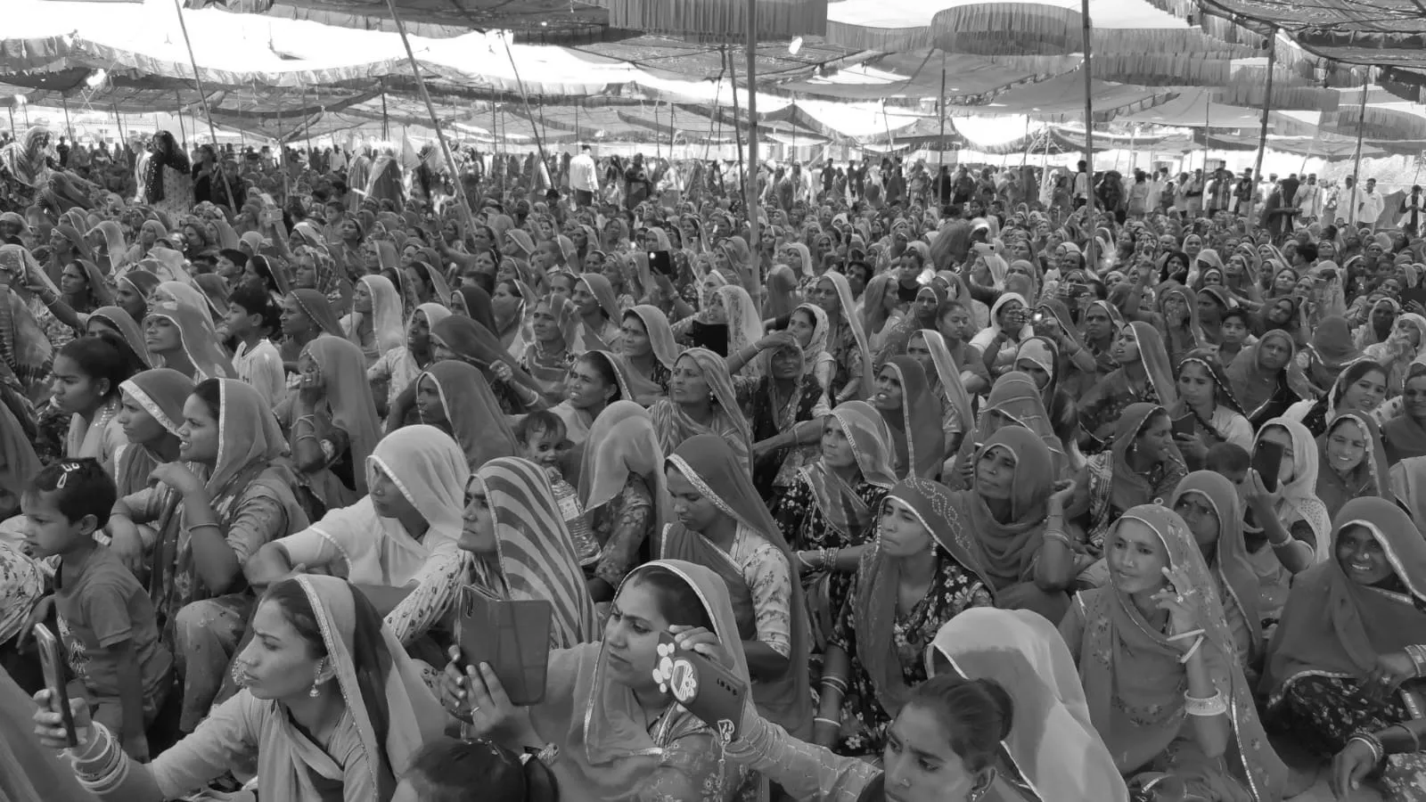 Villagers examining lists together